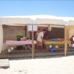 Masajes UMA en la playa de Oliva